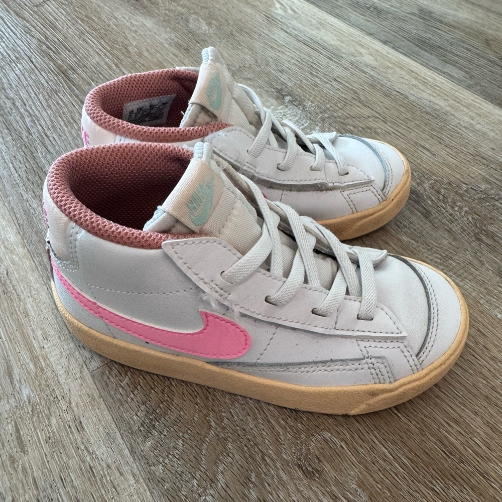 Nike White and Pink Sneakers with High-Top Design and Soft Material